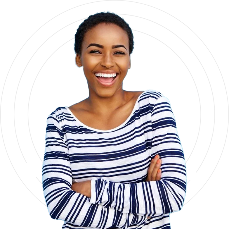 A woman smiling with her arms crossed.