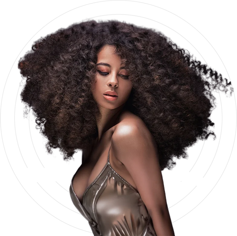 A woman with very large hair in front of a black background.